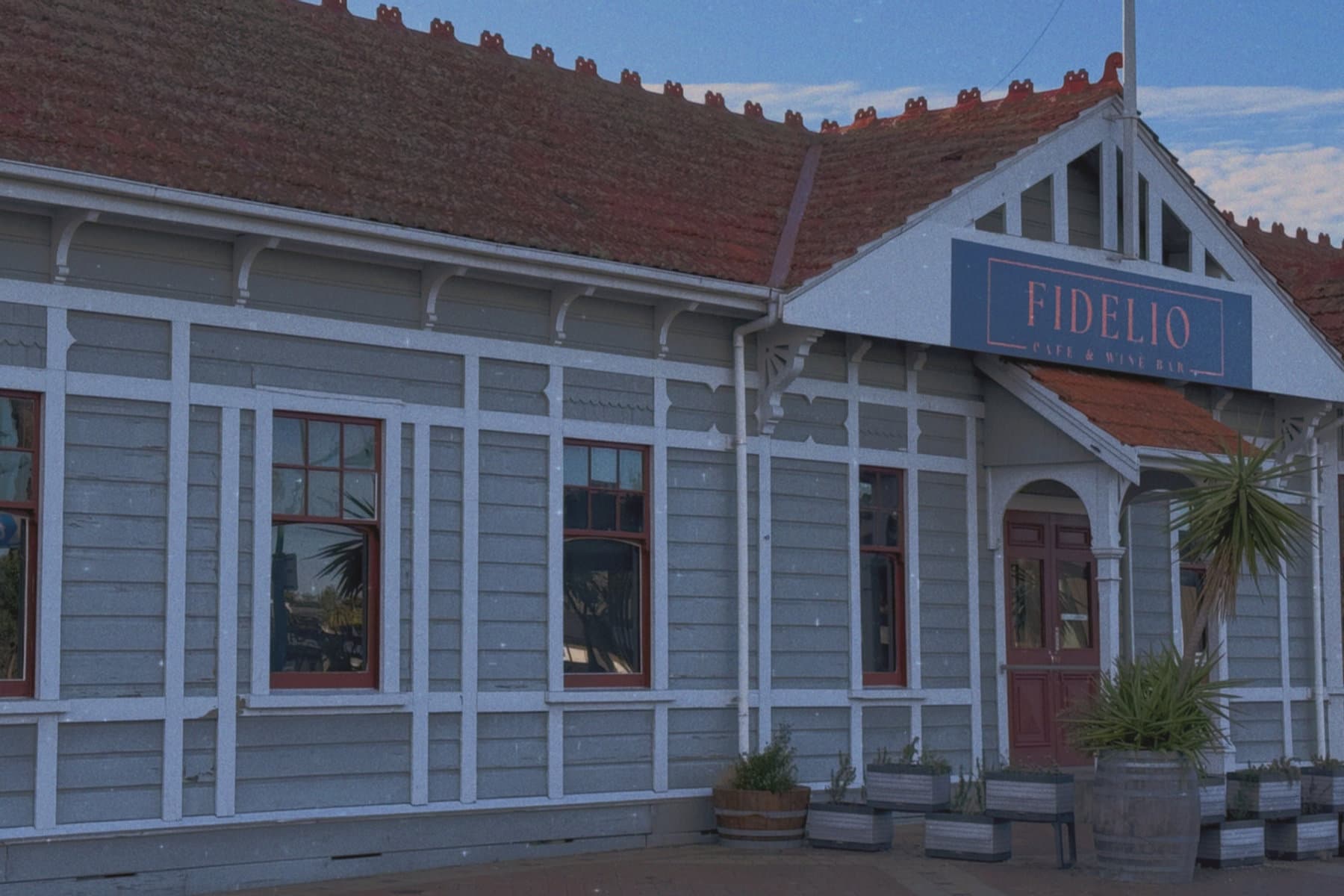 The Fidelio building, a heritage weatherboard station with a red tile roof